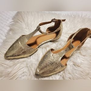 Gold flats with ankle strap